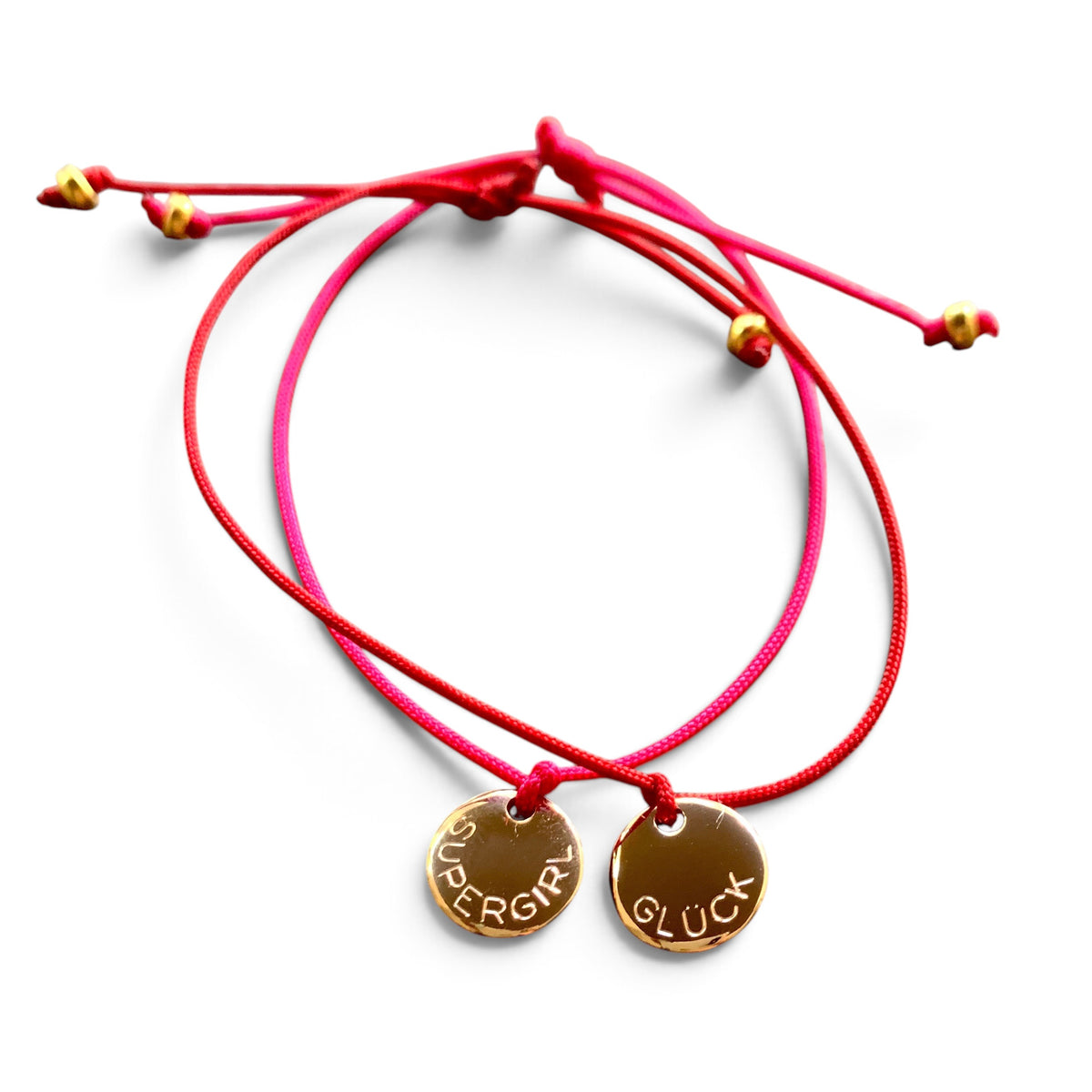 ANNA VON BERGMANN Armband Smarty mit runden Goldplättchen an pinken Nylonkordeln und individueller Gravur
