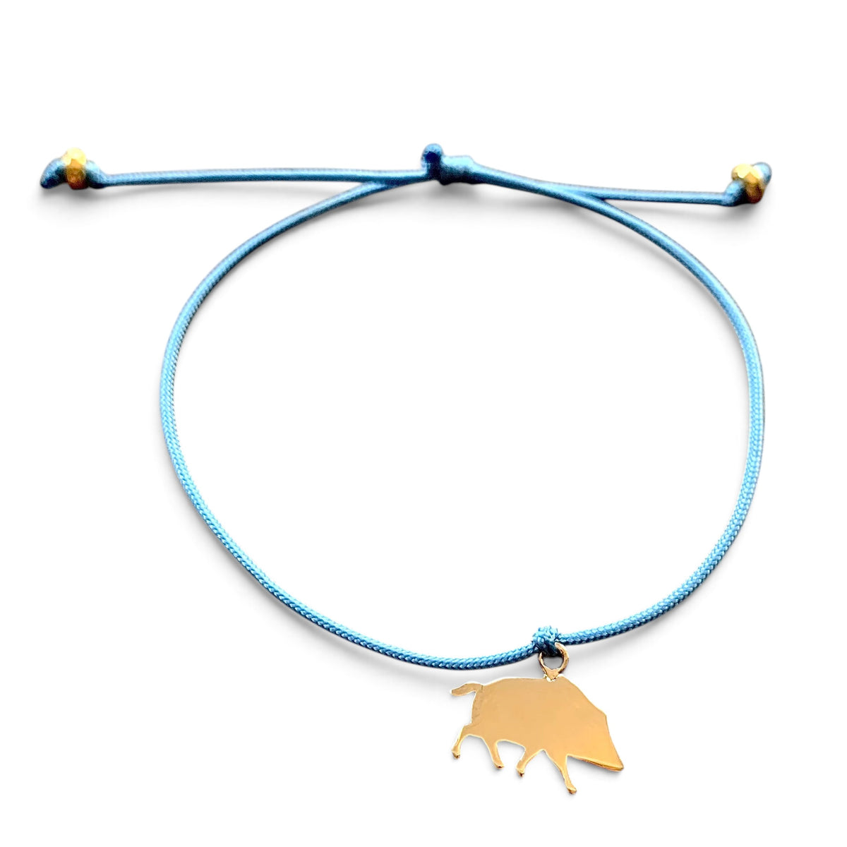 ANNA VON BERGMANN Armband Kleines Glück mit blauem Nylonband und goldplattiertem Wildschwein-Anhänger