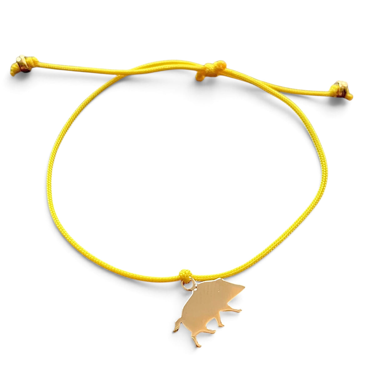 ANNA VON BERGMANN Armband Kleines Glück mit gelber Nylonkordel und goldplattiertem Wildschwein-Anhänger aus Messing