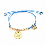 ANNA VON BERGMANN Kordelarmband in Blau mit goldener Gravurplatte und Schmetterlingsanhänger mit Zirkonia