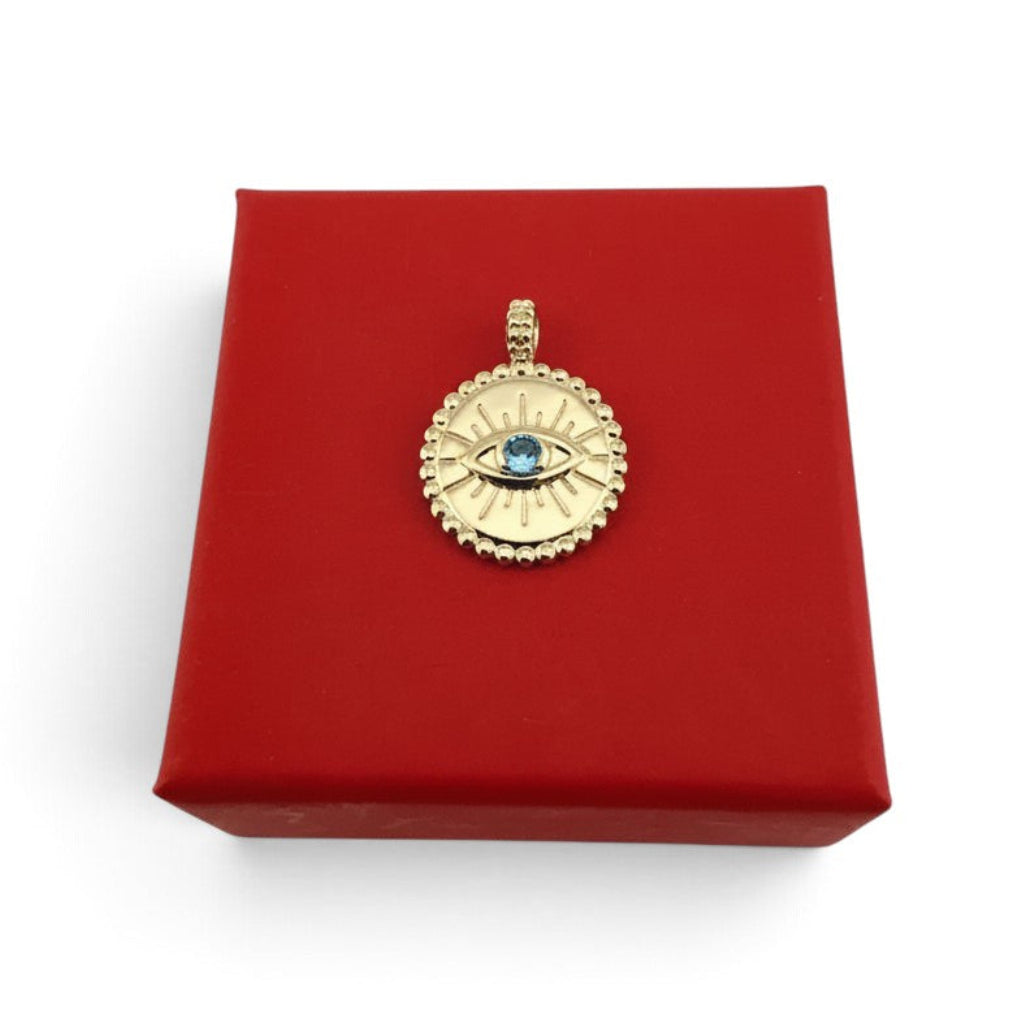 ANNA VON BERGMANN runder Anhänger Protecting Gaze aus 18k goldplattiertem Messing mit blauem Zirkonia Auge-Motiv